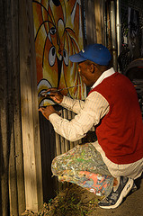 JoJo Fekwa will be painting again at Art in the Alley. You've seen his work all over town (mural at Trinidad and Florida, for example). 